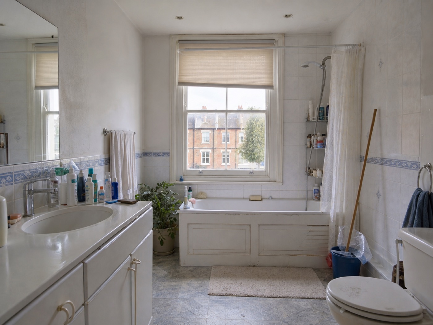 Example of a dated family bathroom before renovation