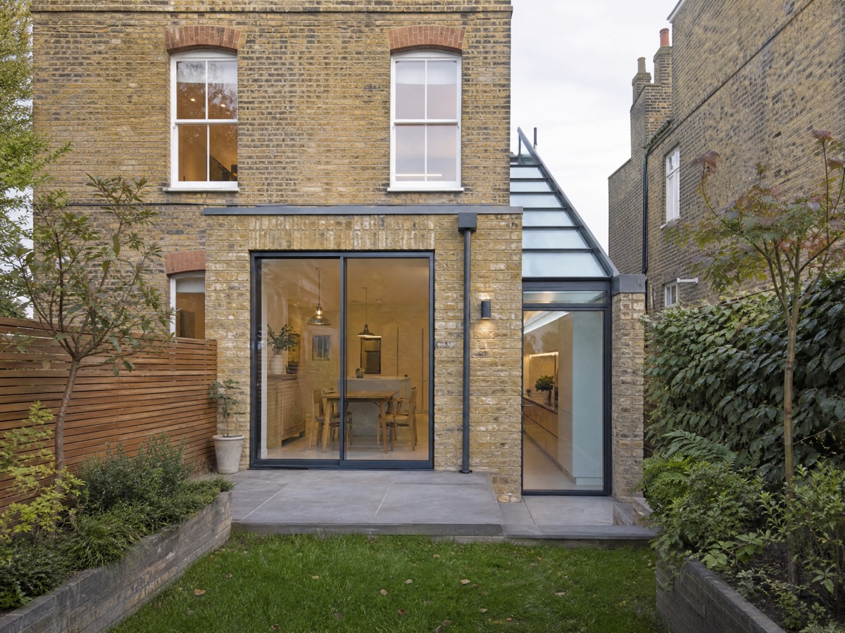 Concept image of a side-return extension with a sloping glass roof