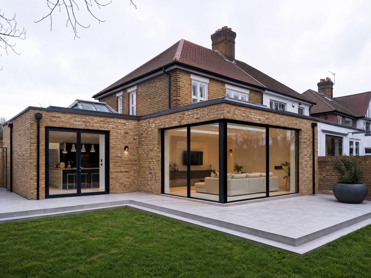 Concept image of an L-shaped wraparound extension with corner glazing