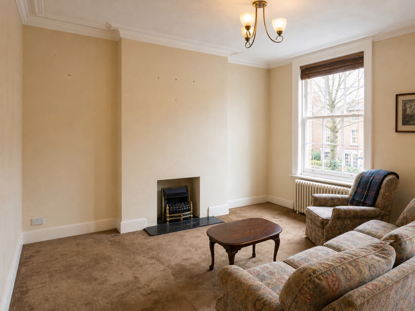 Example of a dated living room before renovation